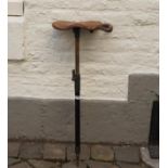 Antique hunting stick with leather seat, thirties/fourties 27.00 % buyer's premium on the hammer