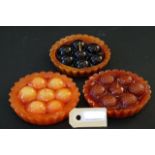 Three vintage wax candles, in the shape of tarts, diam. 10 cm (3x) 27.00 % buyer's premium on the