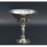 Georg Jensen (1866-1935),a Danish silver tazza, grape pattern, on circular foot, the sprial stem