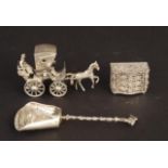 Silver sugar scoop, 925, 19th century + Silver filigree miniature of a dresser, 835 + Miniature