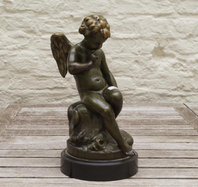 Bronze sculpture on marble base, Angel, 20th century, h. 26 cm.