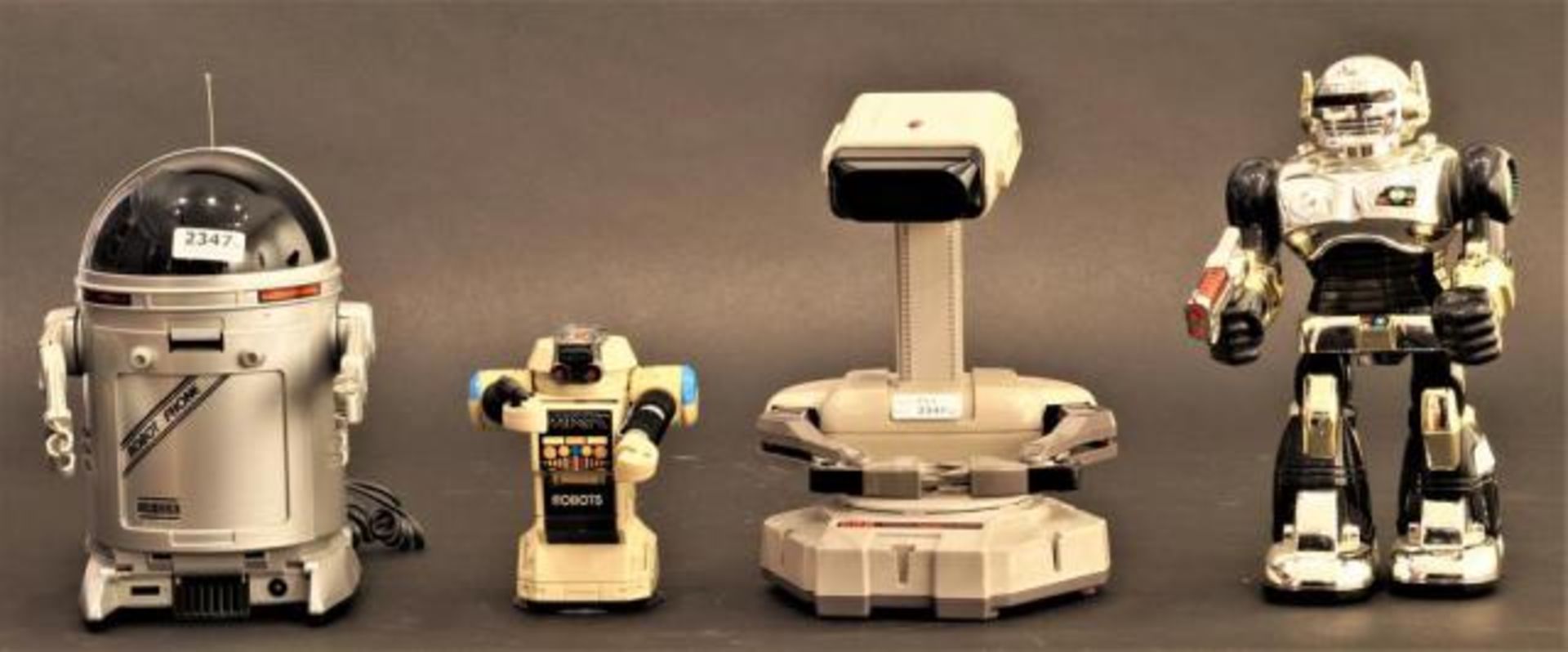 Four vintage robots, a.o. "Phone Robot", h. 25 cm (4x)