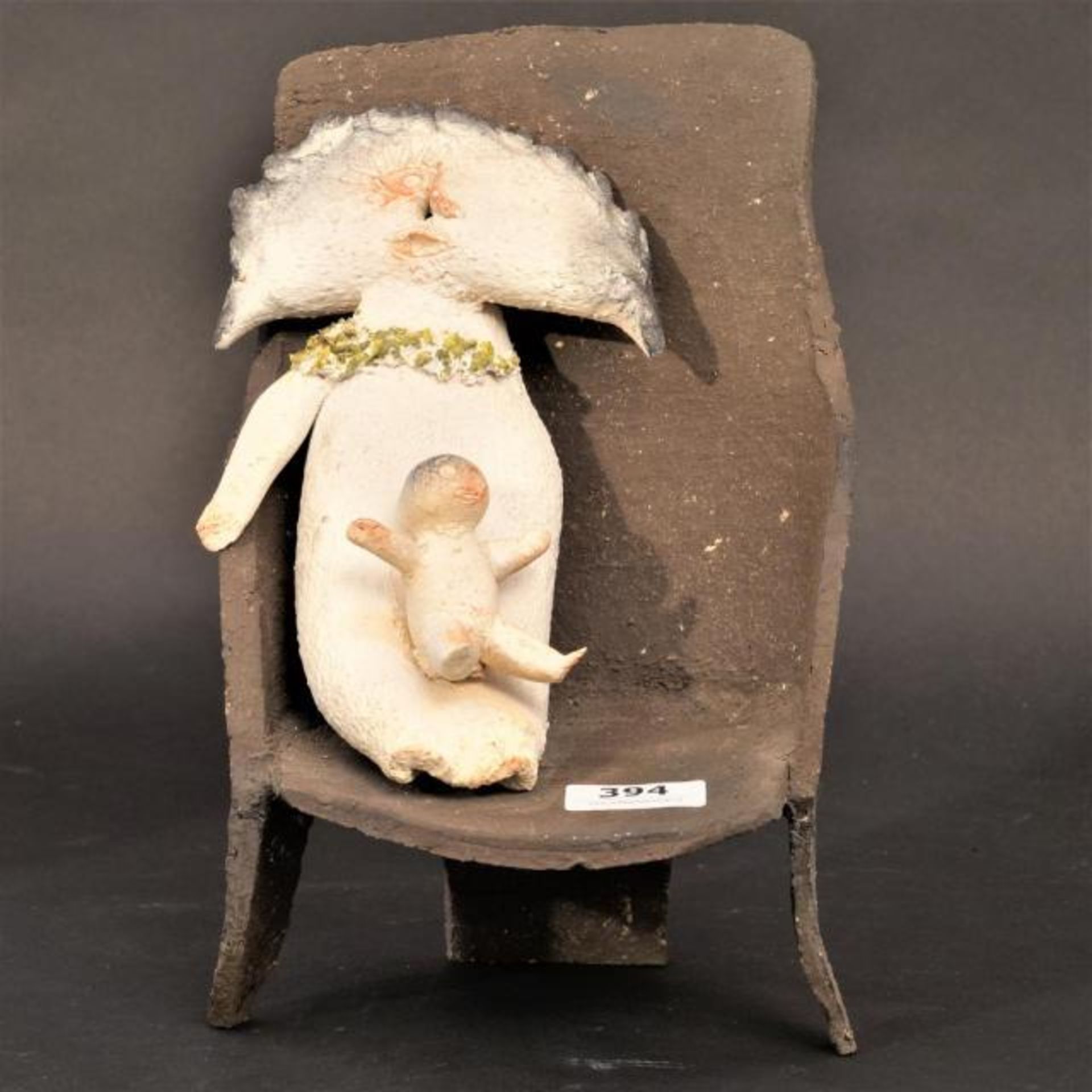 Rob Stultiens (1922-2002), glazed ceramic sculpture, Mother and child in a chair, h. 28 cm.