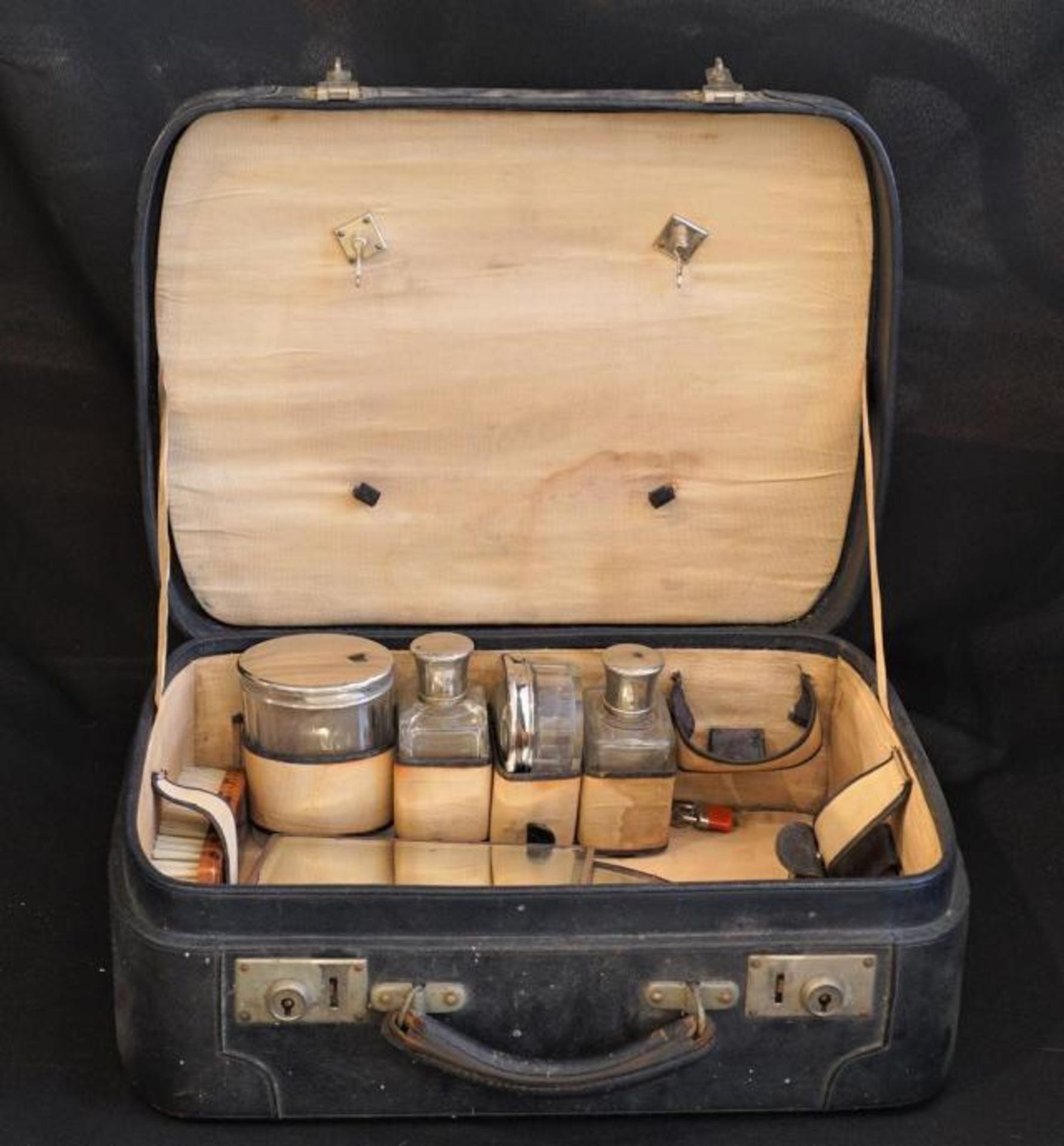 Leather travel suitcase with content