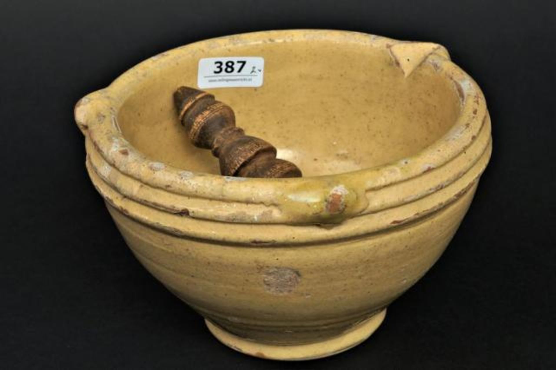 Ceramic mortar, 18th century, with wooden pestle, h. 11 cm (2x)