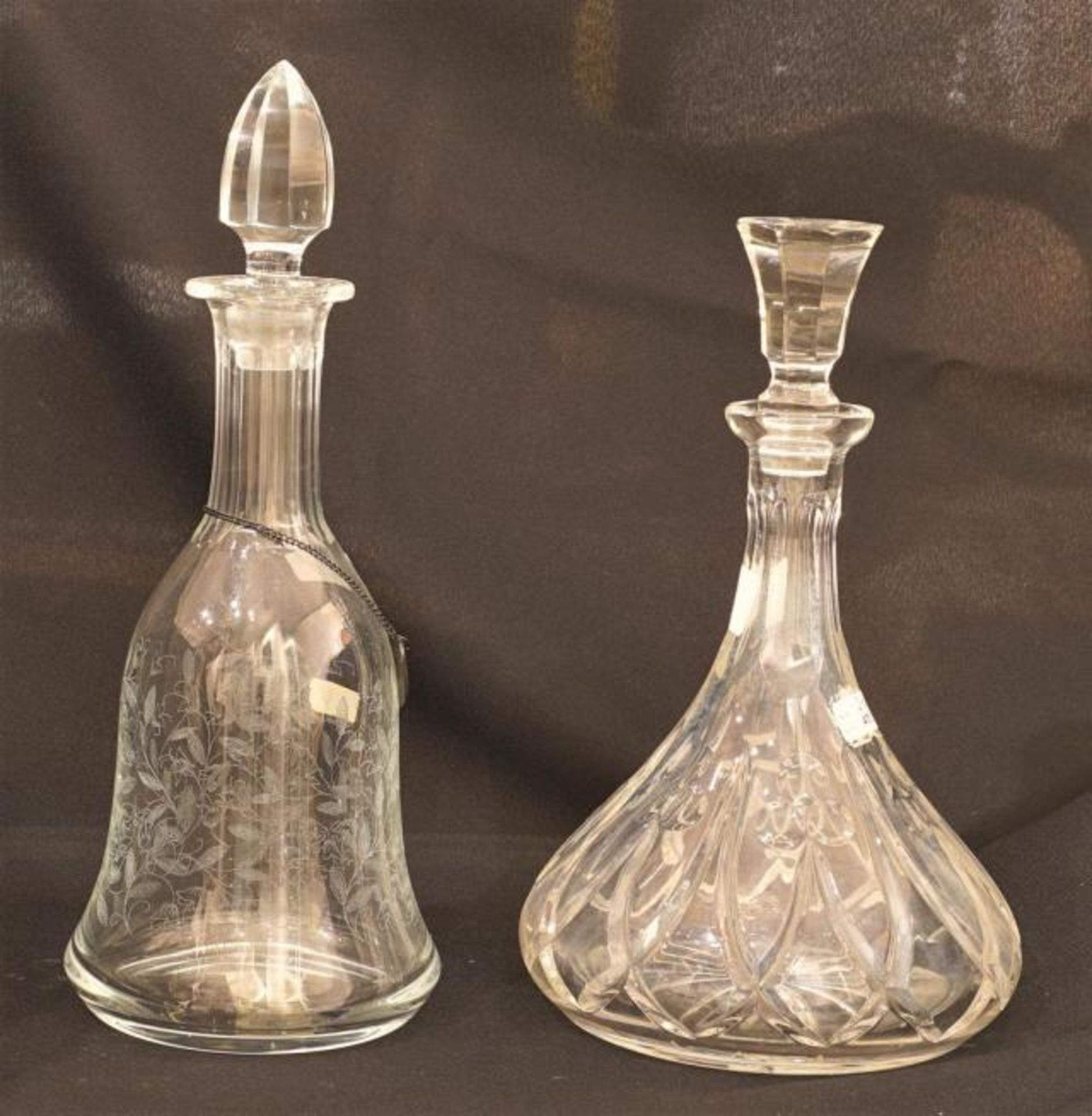 Two carafes, glass and crystal, h. 28 and 32 cm (2x)