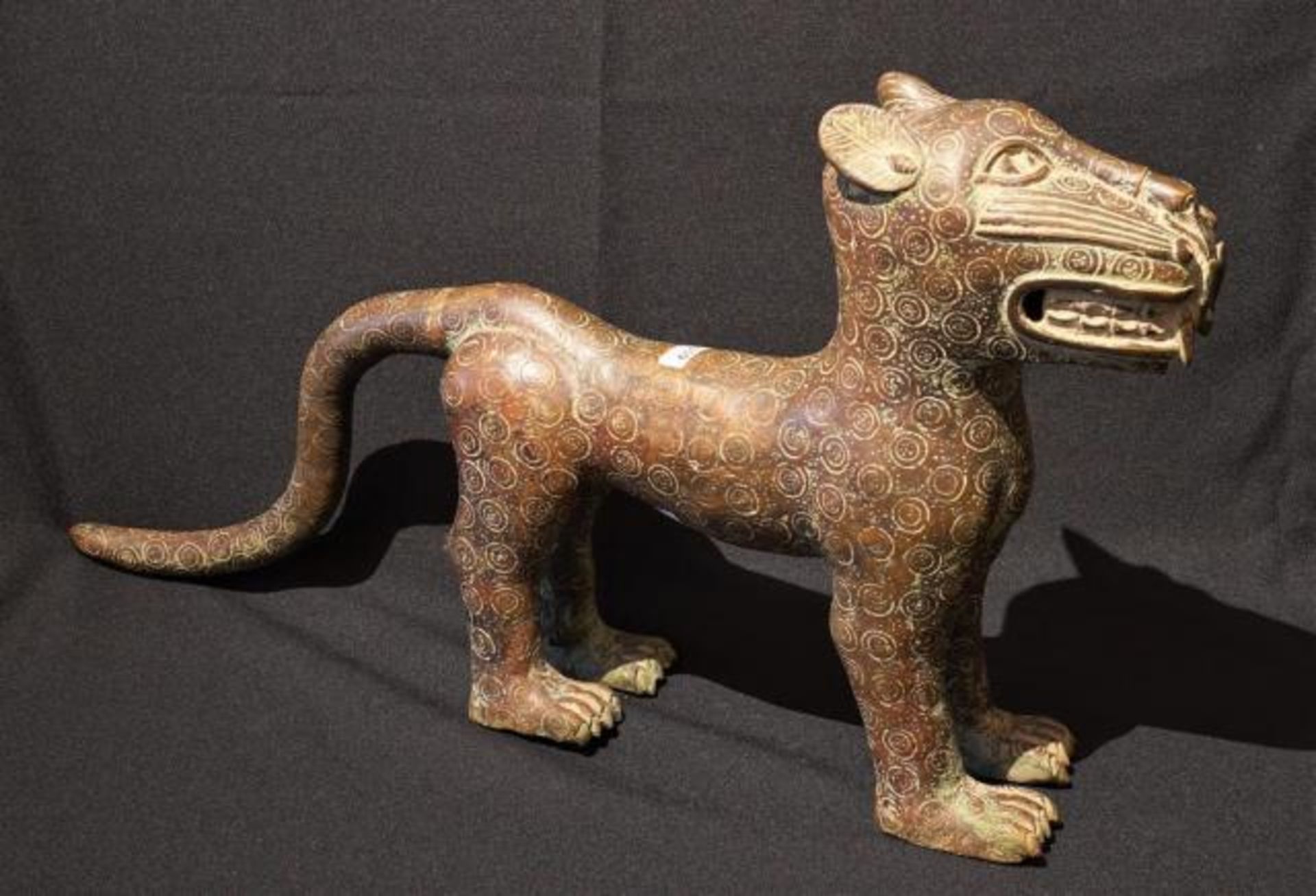African bronze lion, dim. 38 x 58 cm.