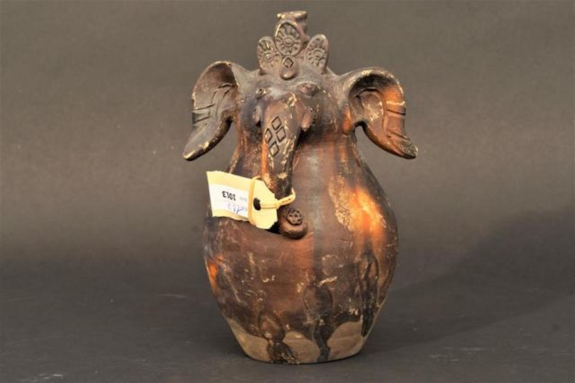 Indian terracotta money bank, wear and tear, h. 20 cm.