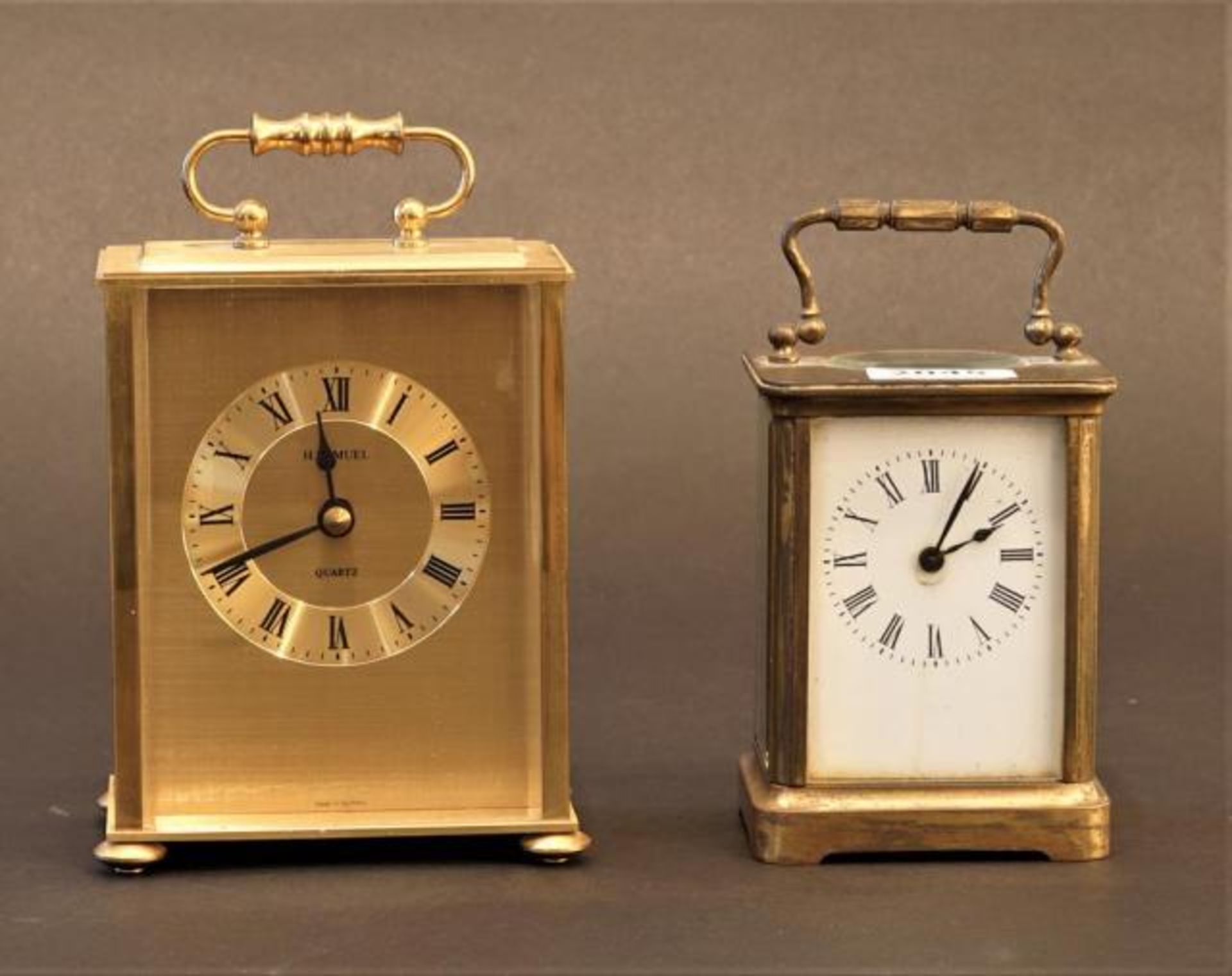 Two English carriage clocks, 20th century, a.o. H. Samuel (2x)