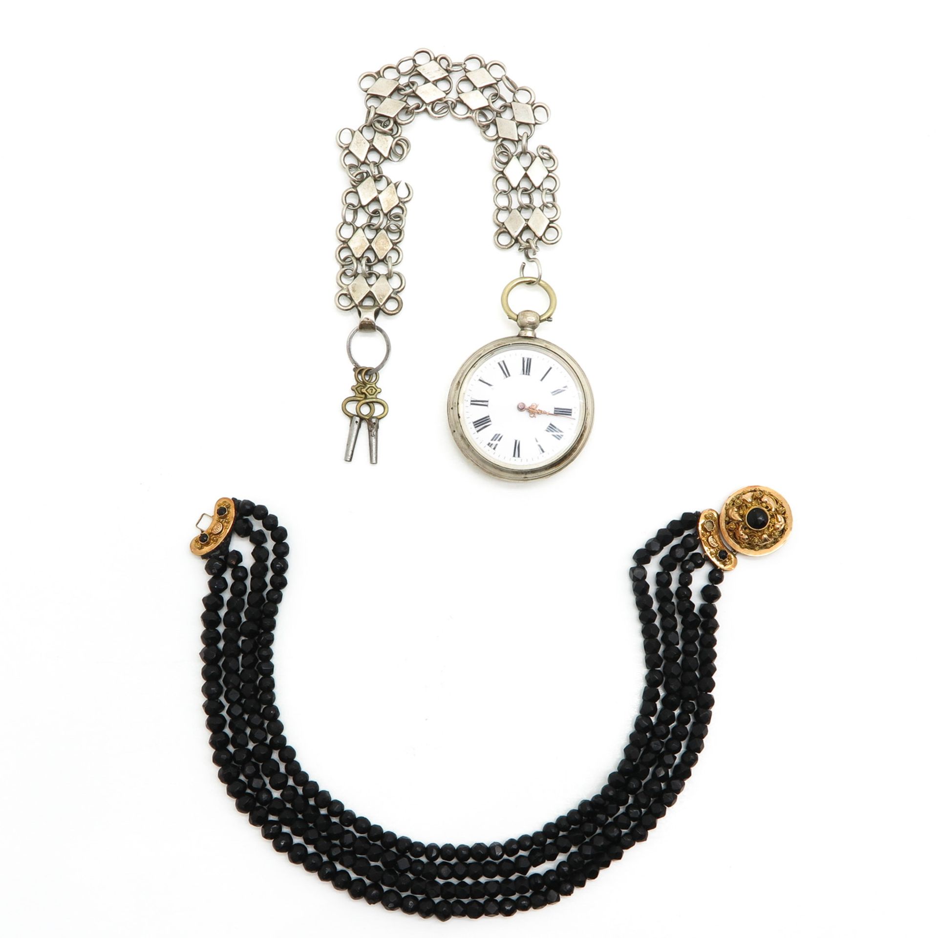 A Silver Pocket Watch and Jet Necklace on Gold Clasp