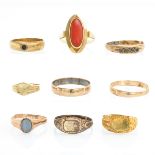 A Diverse Collection of Nine Gold Rings