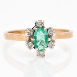 A 9KG Emerald and Diamond Ring