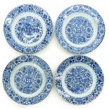 A Series of Four Blue and White Decor Plates