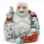 A Porcelain Buddha Sculpture