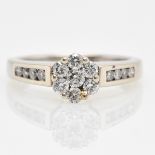 A 10KWG Ladies Diamond Ring Approximately 0.56 CTW