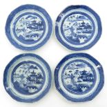 A Series of Four Blue and White Decor Plates