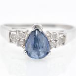 A 9KWG Diamond and Sapphire Ring
