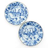 A Pair of Blue and White Decor Plates