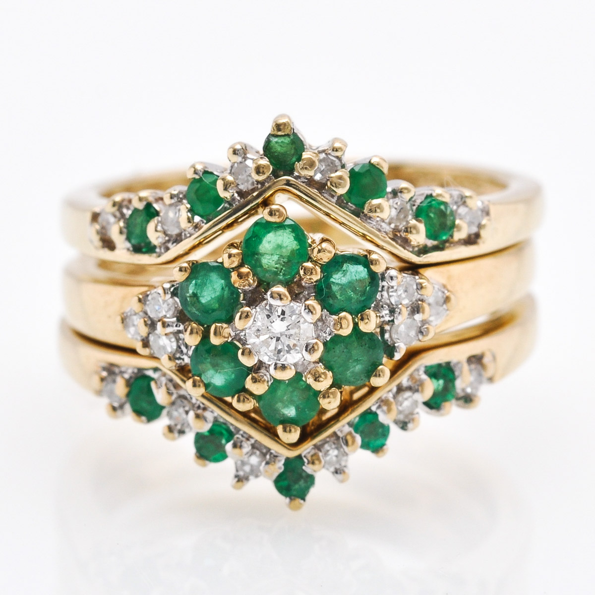 A 9KG Emerald and Diamond Ring with Ring Guard