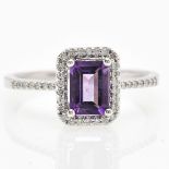 A 9KG Ladies Amethyst and Diamond Ring