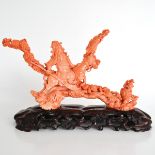 An Exquisite Carved Red Coral Sculpture