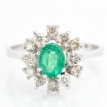 A 18KWG Ladies Emerald and Diamond Ring