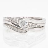 A 14KWG Diamond Engagement and Wedding Band