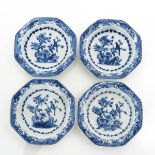 Four Blue and White Plates