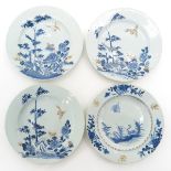 A Collection of Four Blue and White Decor Plates