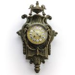 A Bronze Cartel Clock