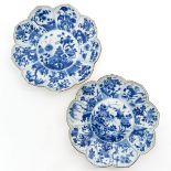 A Pair of Blue and White Decor Plates