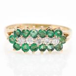 A 9KG Emerald and Diamond Ring