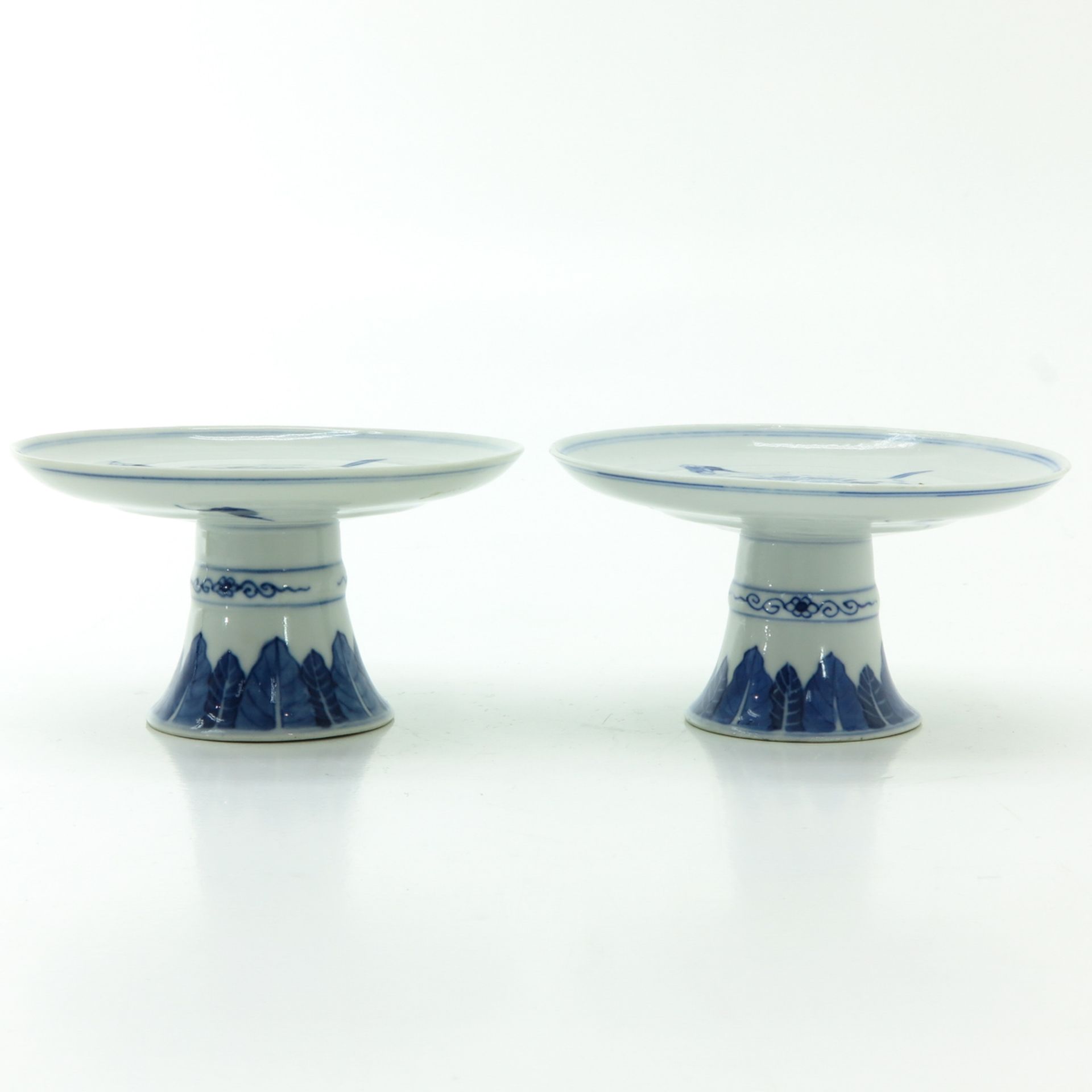 A Pair of Blue and White Stem Trays