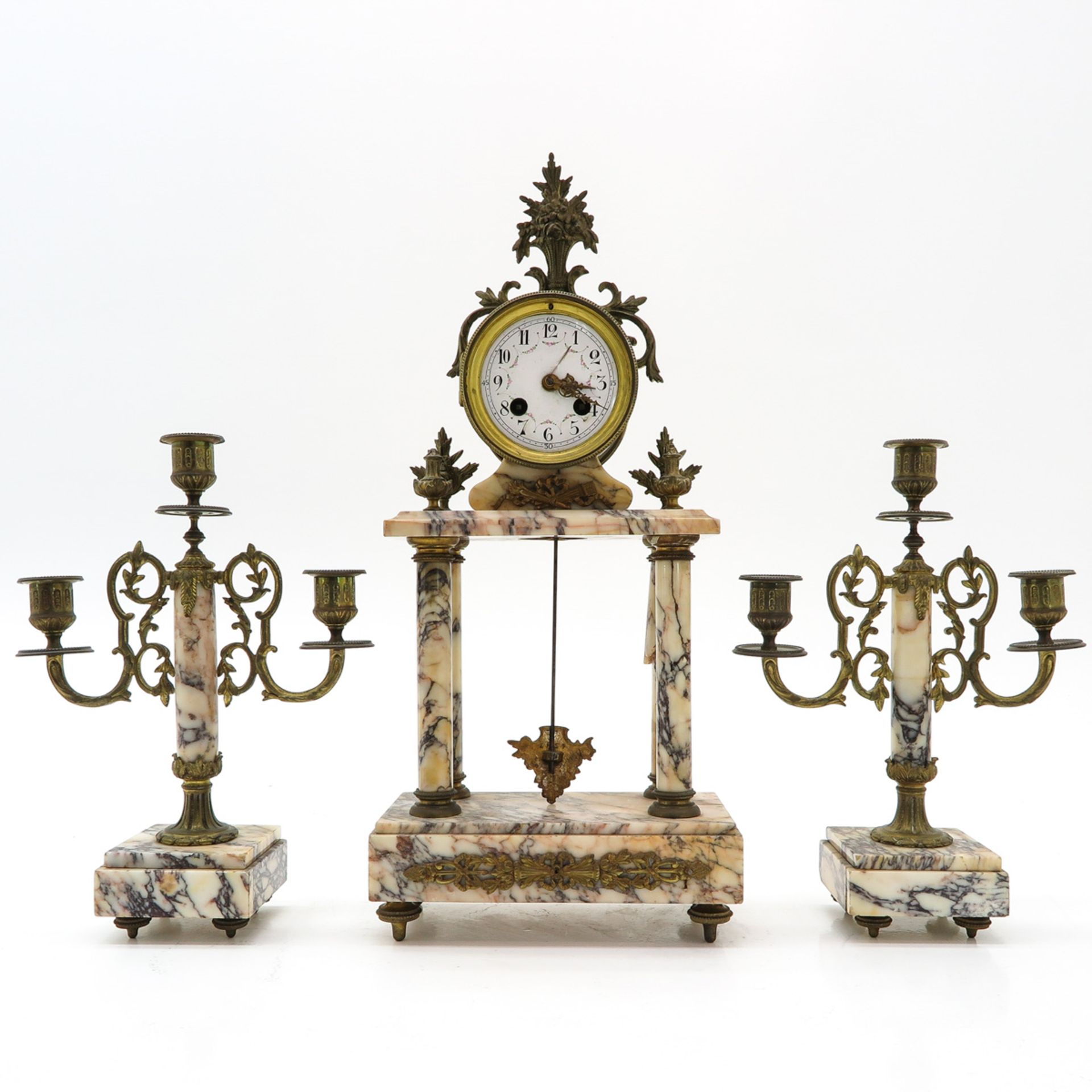A 19th Century Three Piece Clock Set