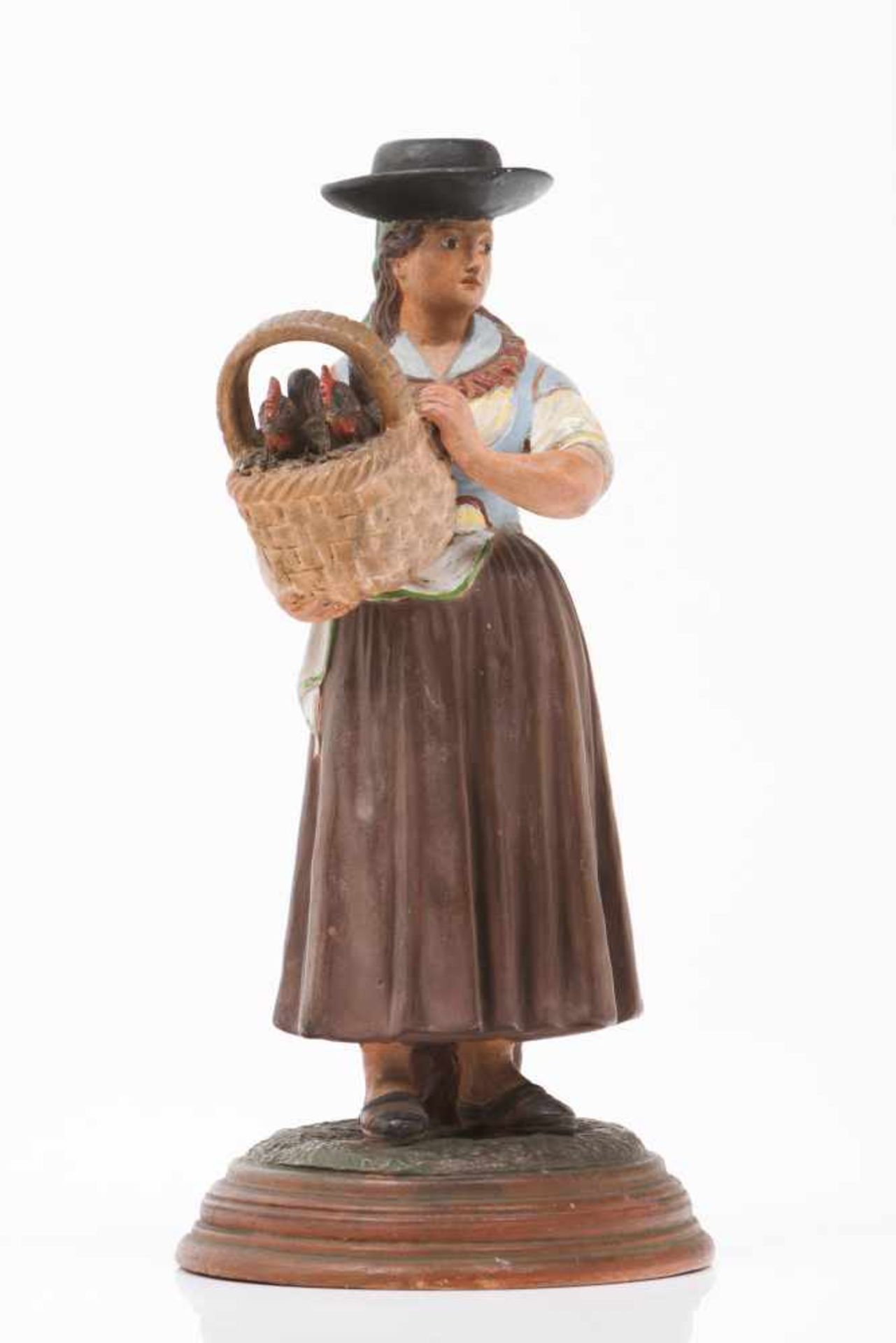 PeasantPortuguese faience, Caldas da RainhaPolychrome terracotta sculpture representing peasant with