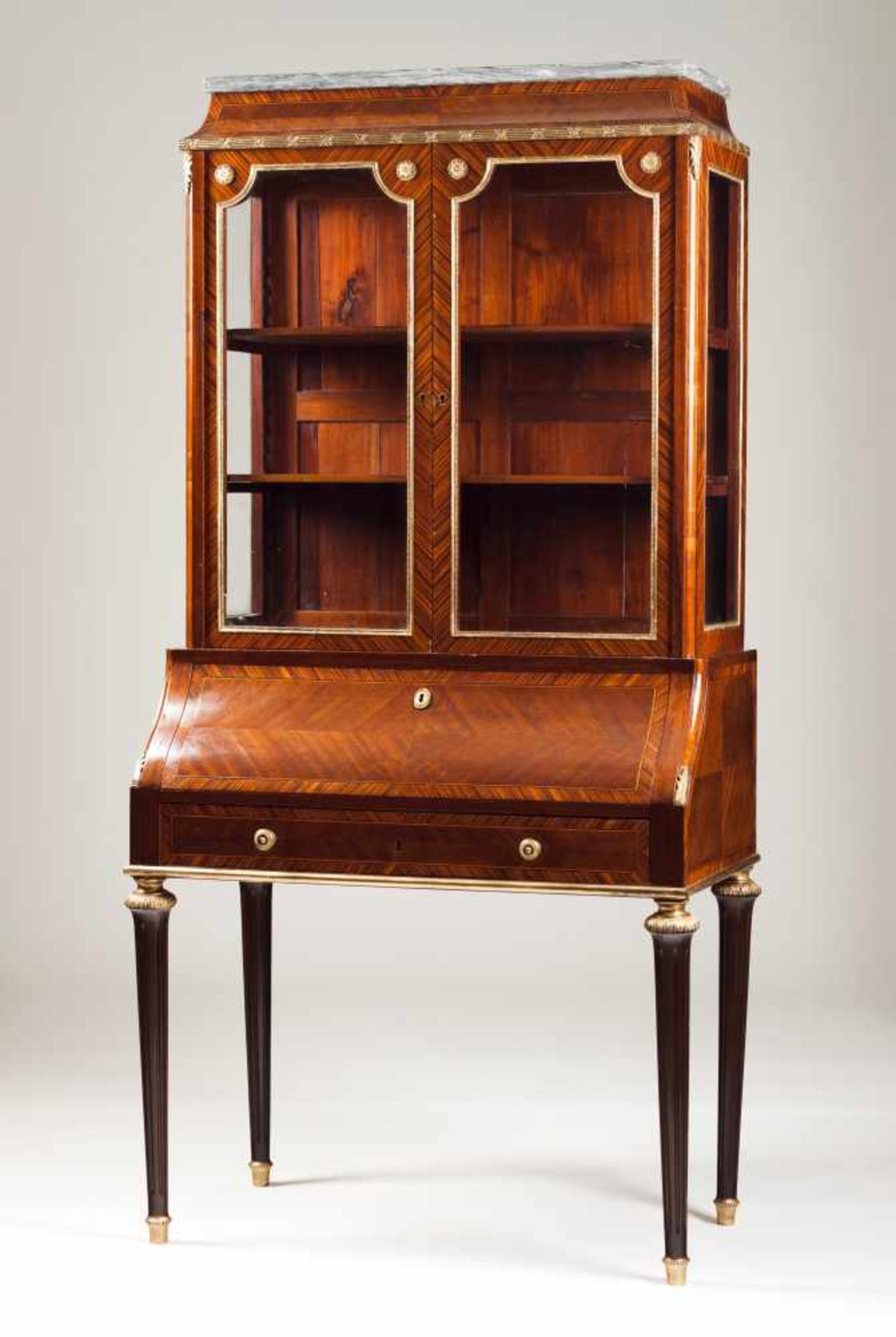 A Napoleon III style bureau with book cabinetMahogany and burr-mahoganyOne drawerBurr-walnut