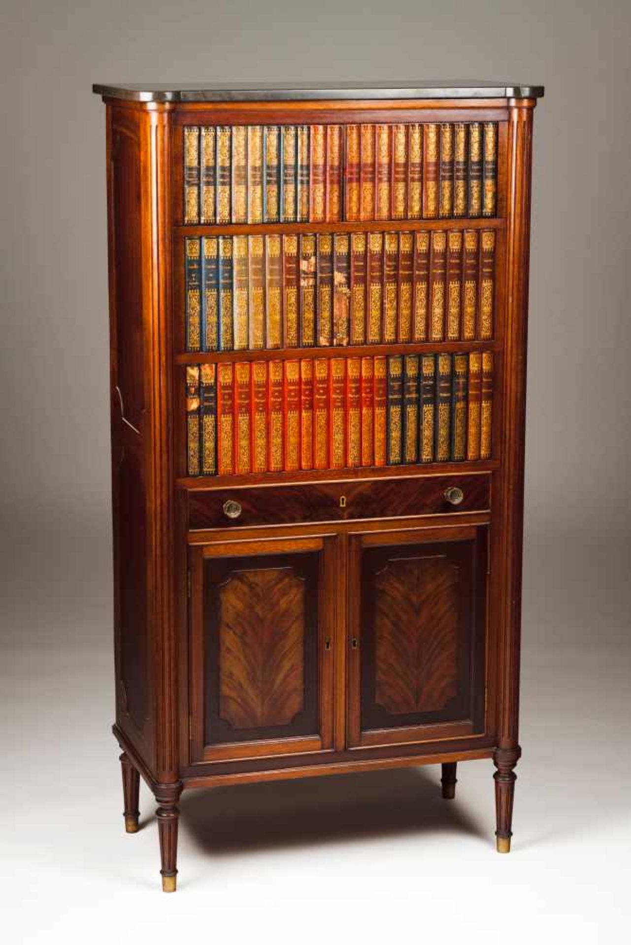Secretaire à AbattantMahogany and other woodsDoor and front decorated with book spinesMarble
