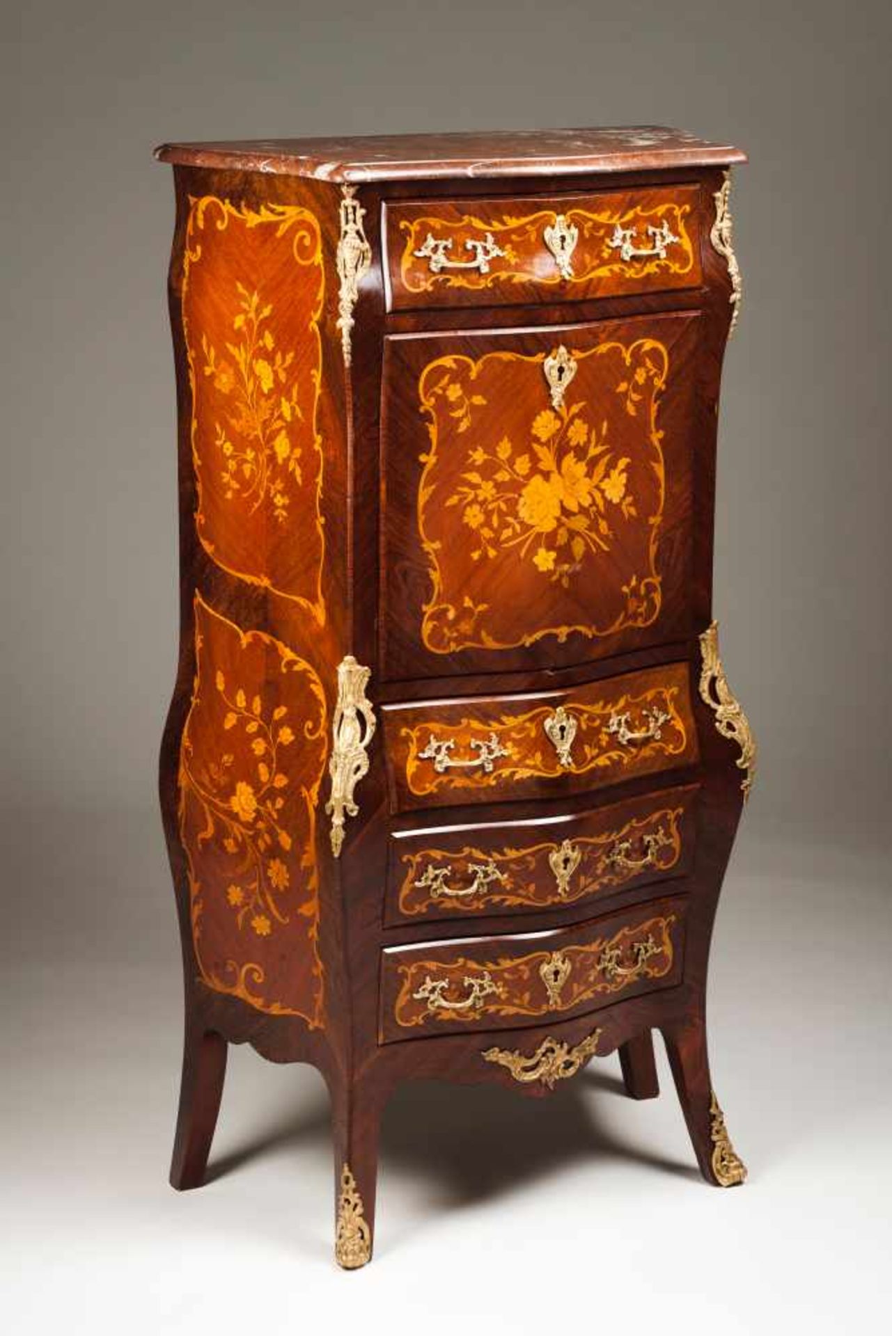 A Louis XV style secretaire à AbattantRosewood, kingwood, thornbush and satinwood marquetry