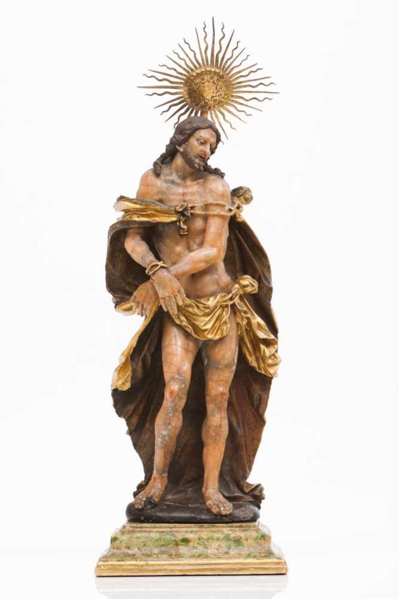 Christ of the green canePolychrome and gilt stone sculptureMarbled wood base and brass