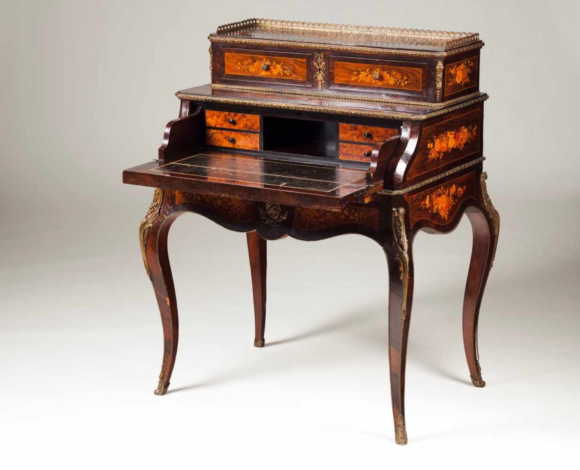 A Louis XV style ladies bureau WalnutMarquetry decoration Three drawers and green leather lined