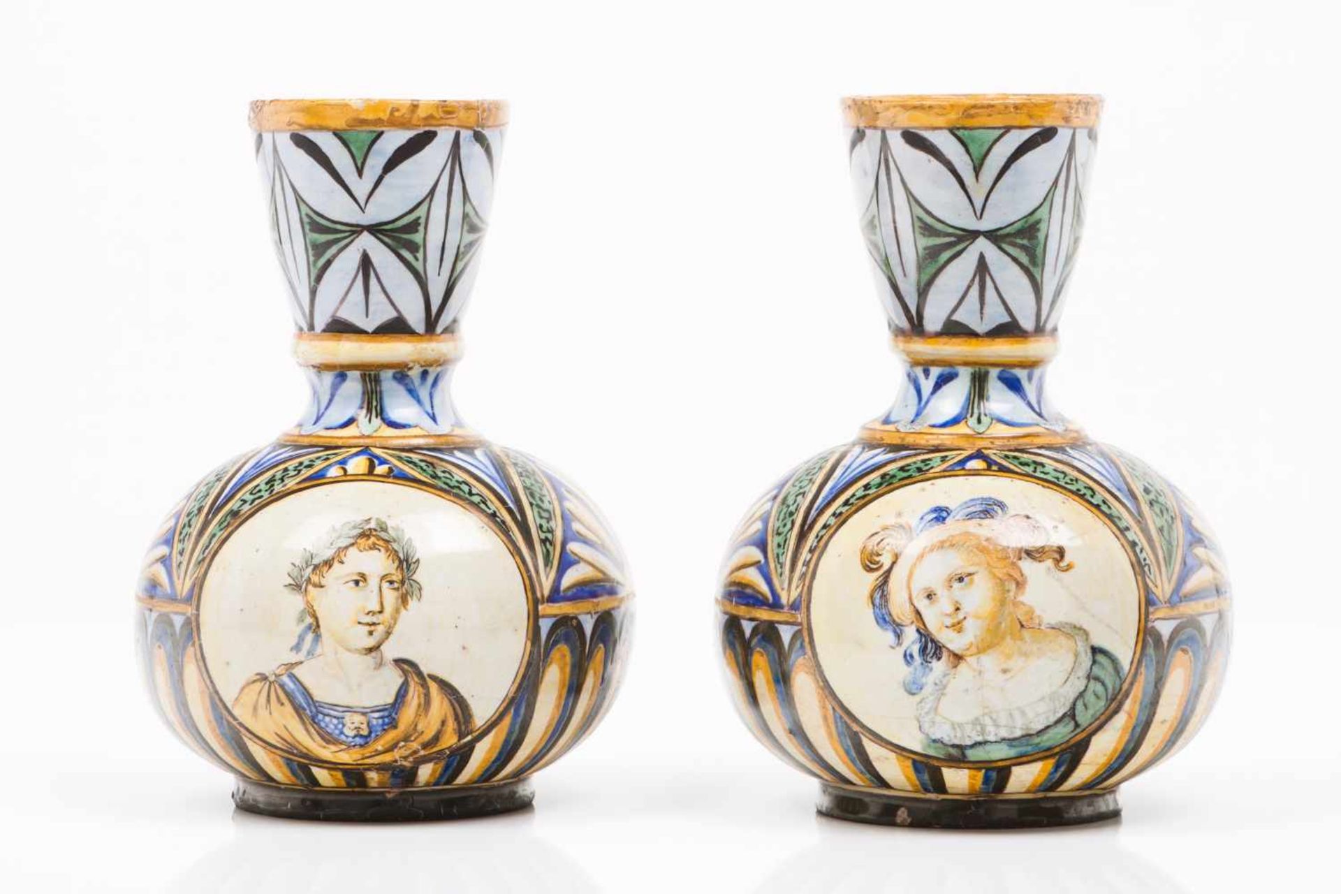 A pair of small vasesItalian faiencePolychrome decoration depicting busts at the centreItaly, late