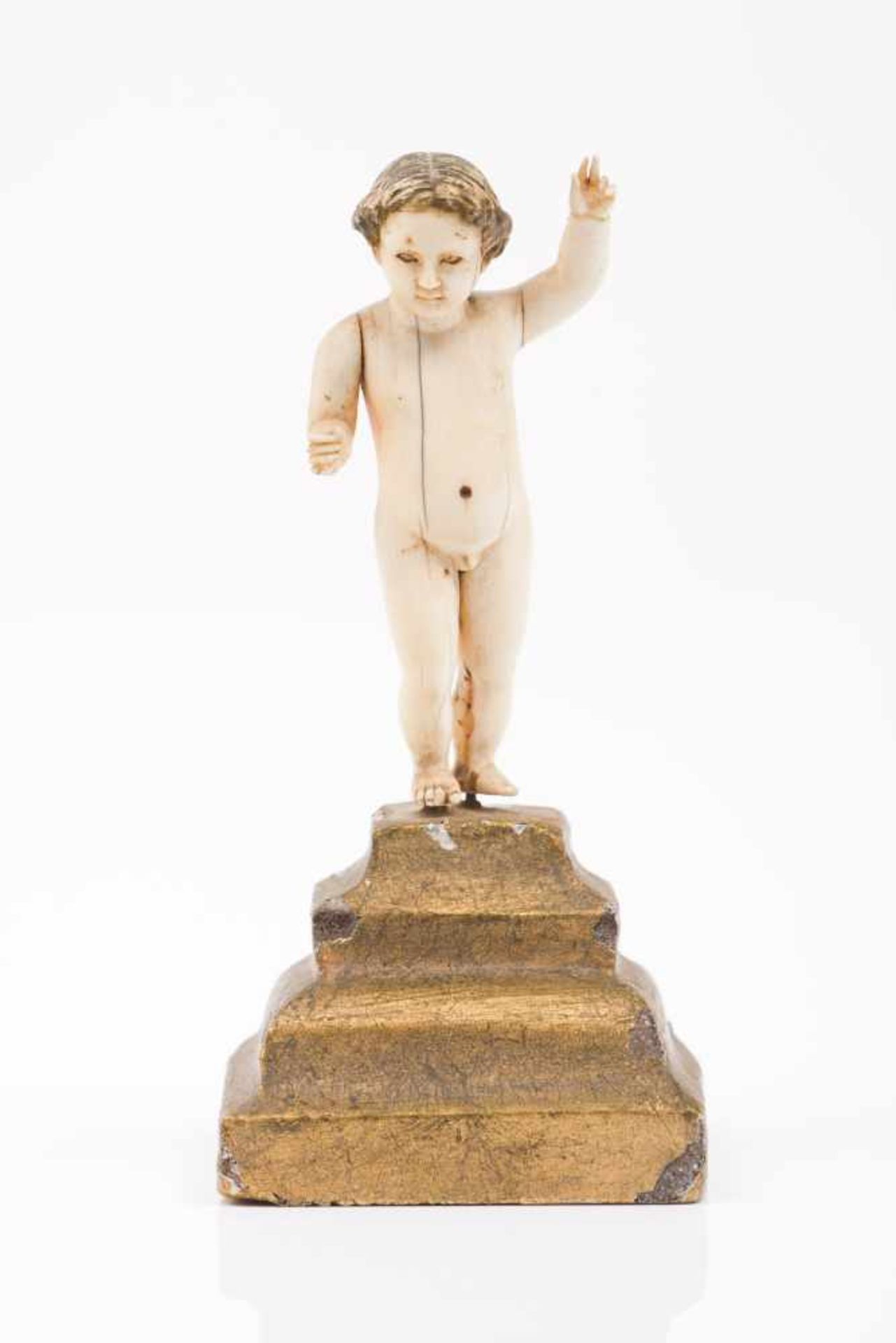 Child JesusIvory Indo-Portuguese sculptureTraces of polychromy and gilt wood base18th centuryHeight: