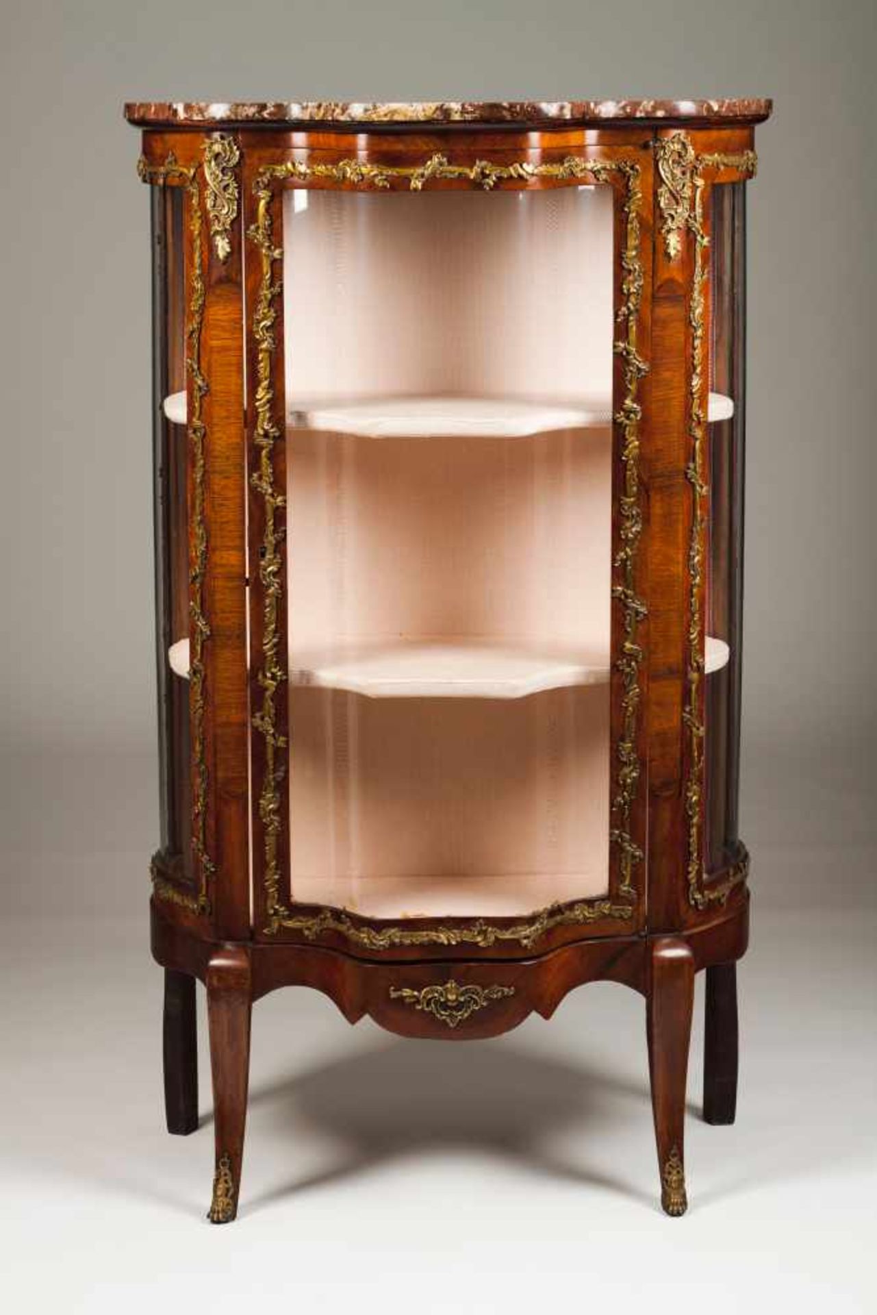 A Louis XVI style showcaseRosewood veneered woodGlazed front and sidesGilt bronze