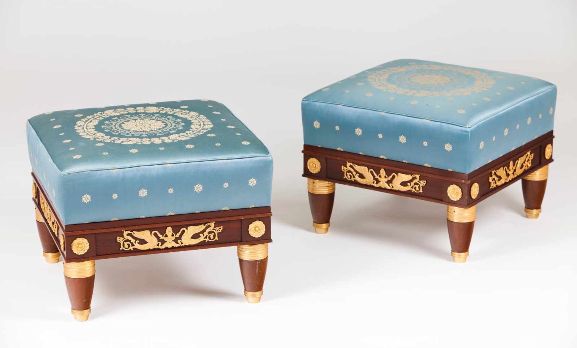 A pair of Empire style stoolsMahoganyGilt metal mounts and silk upholstery20th century47x61x61 cm