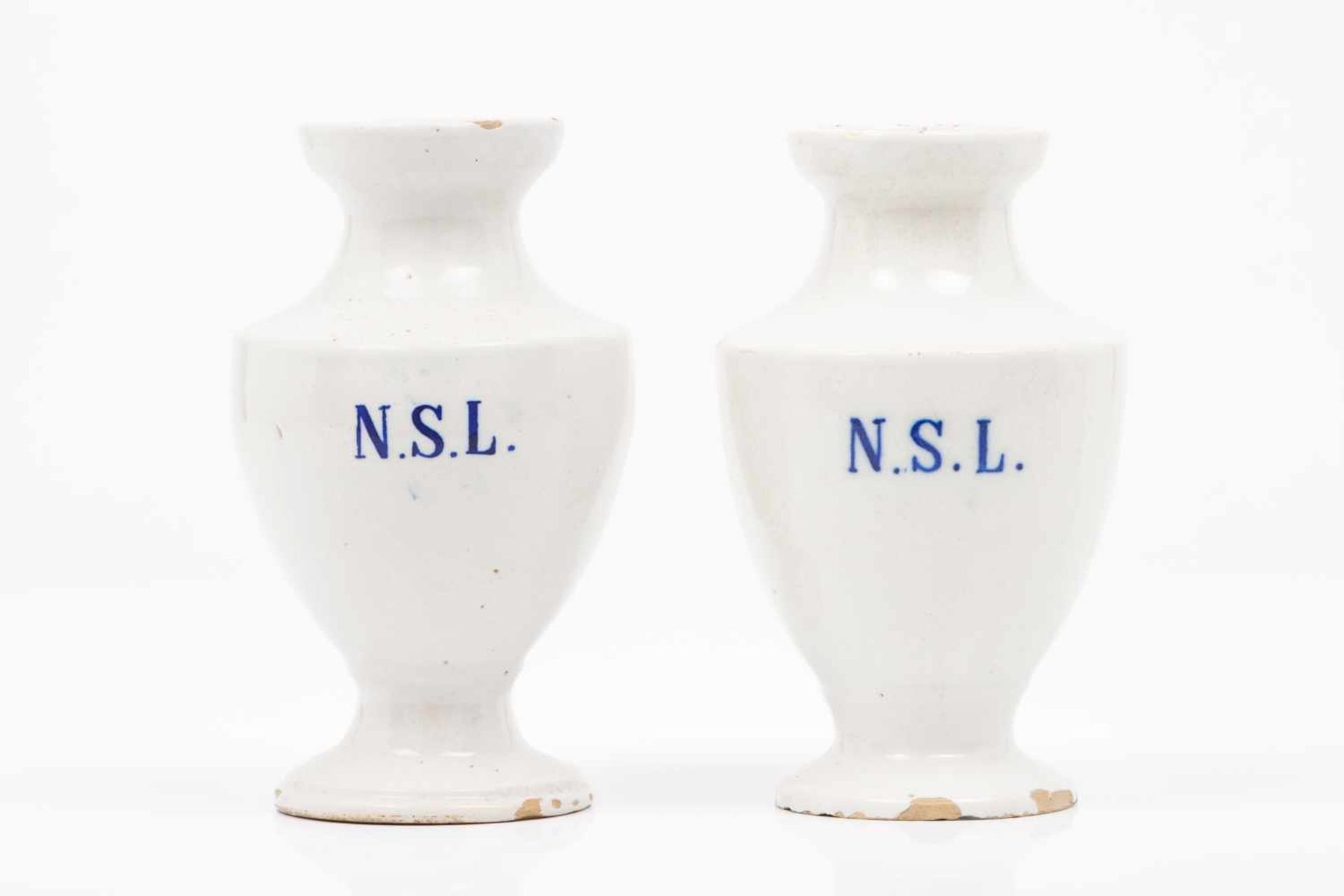 A pair of vasesPortuguese faienceInscription "NSL"19th century(defects)Height: 19 cm