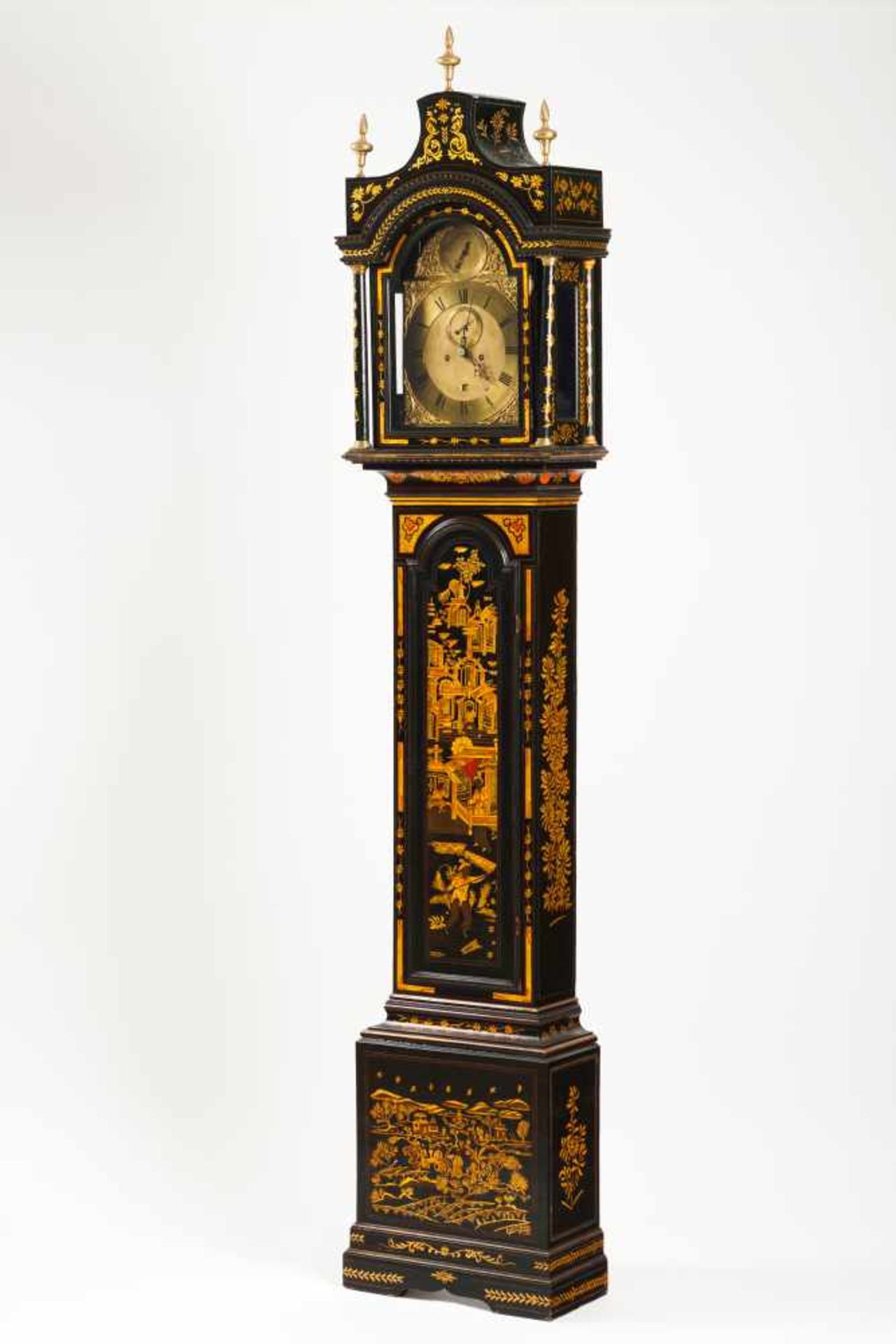A 19th century portuguese long case clock.Walnut and chestnut, metal and enamel dial.Jéremie Girod -