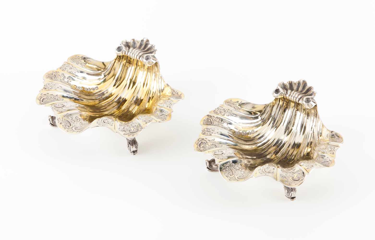 A pair of Victorian shellsEnglish silver, realistically cast and chiselled with volutes and foliage.