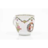 A cupChinese export porcelain"Famille Rose" polychrome enamels and gilt decoration with armorial for