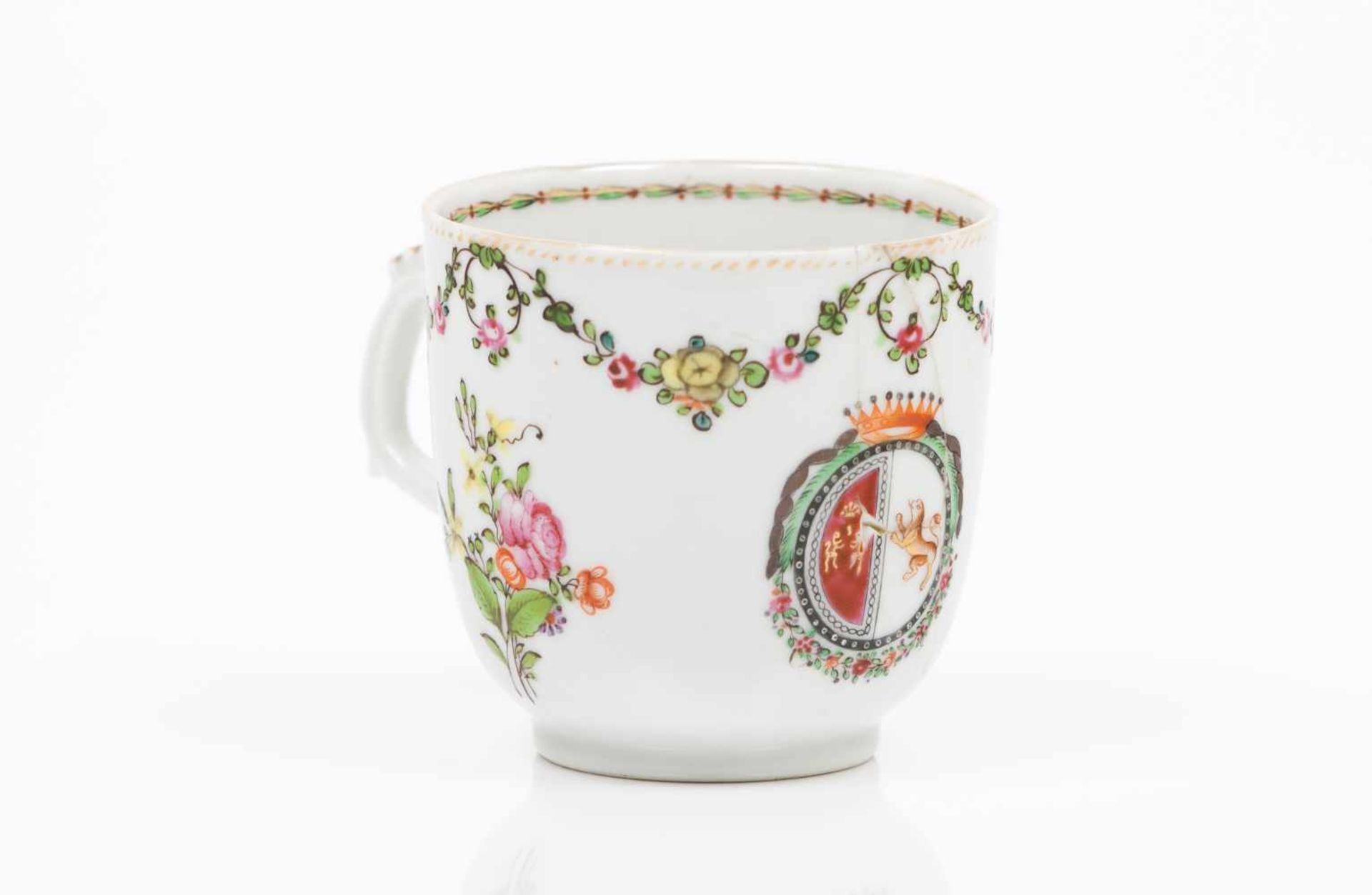 A cupChinese export porcelain"Famille Rose" polychrome enamels and gilt decoration with armorial for