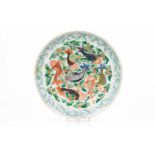 A large plateChinese porcelainPolychrome decoration with carps and foliage scroll motifs19th /